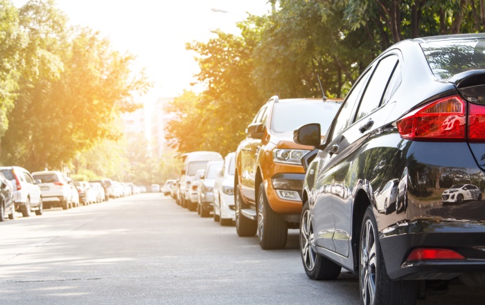 To initiate an on-street parking session, a user opens the Way.com application and searches for nearby parking by entering their city or location.