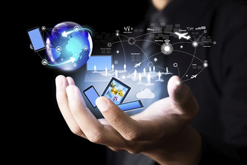 Stock image of globe and laptop depicting connected devices and IoT