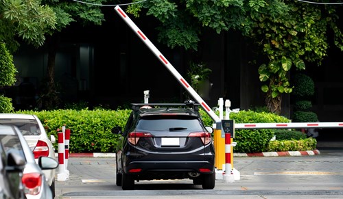 car at a parking barrier