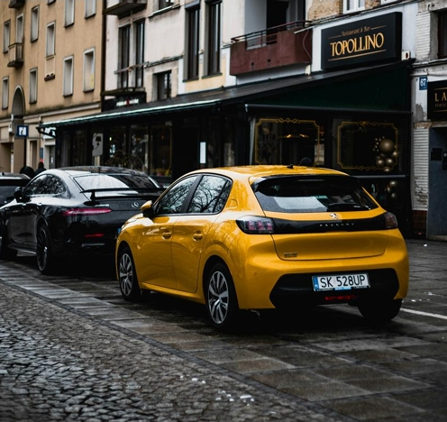 Parked yellow car