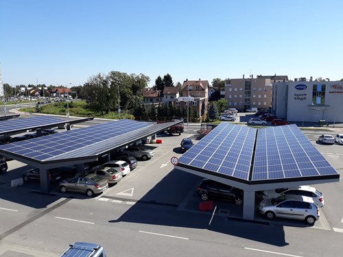 Car parking lot with solar panel carports.