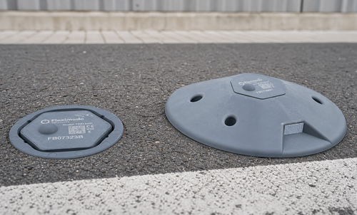 Parking sensors Fleximodo's in-ground parking sensor and on-surface parking sensor shown on the road
