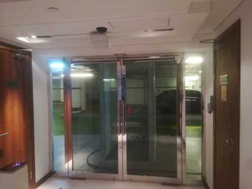 Glass door opens automatically