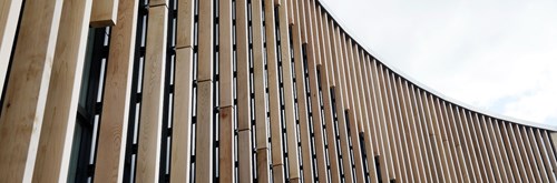 PATENTED DANISH FACADE SYSTEM WITH WOODEN LAMELLAE MOUNTED ON AN ALUMINIUM STRUCTURE