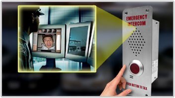 An emergenty intercom with a screen showing video of person using the device