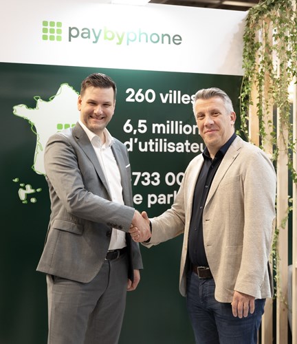 PayByPhone Chief Operating Officer and Designa Chief Digital Officer shake hands
