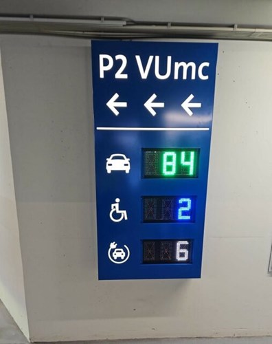 VUmc VUmc parking free spaces sign.