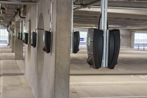 image of EV chargers in a parking lot