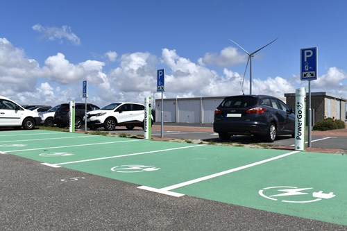 image of parked cars at EV charging stations