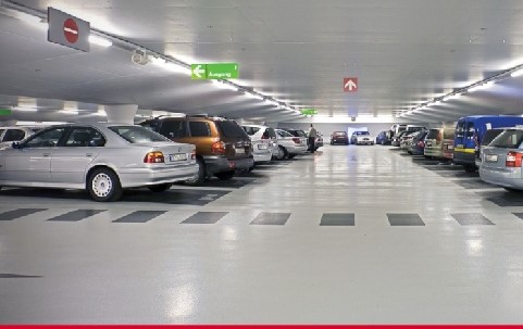 Light fittings run parallel with driving aisles so they don't interfere with wayfinding signage