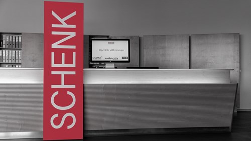 image of a front desk with S&B brands, including Schenk
