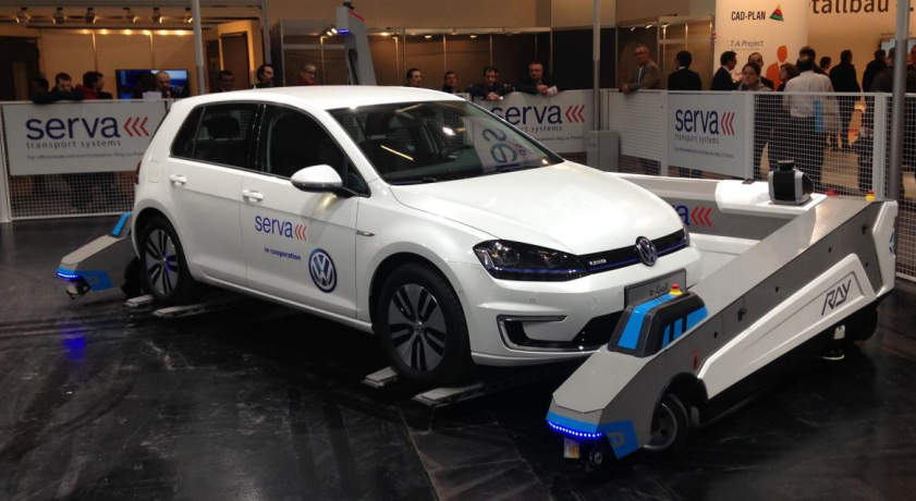 Exiting cooperation between Volkswagen and Serva Transport Systems: Parking robot RAY™ live at BAU 2015 in Munich.