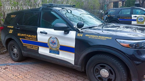 Parking Enforcement in Hampstead Town. Canada Public Security car.