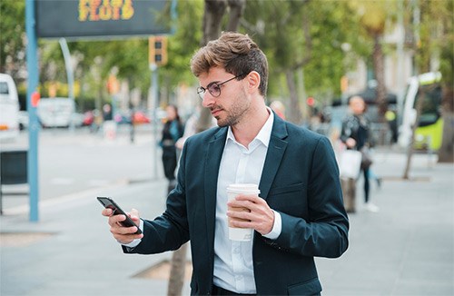 Ecom6 bringing both essential components of payment processing under one roof Man using Ecom6 merchant services