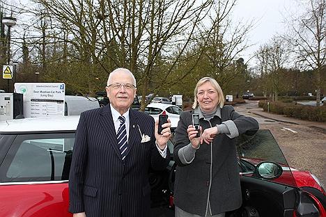  Cllr Walters and Cllr Barker demonstrate the MiPermit scheme at the Swan Meadow car park