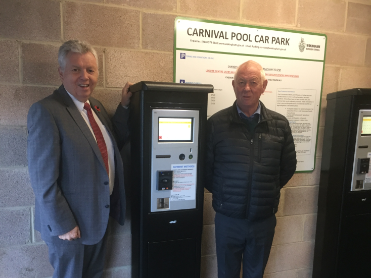 Richard Parsons, Flowbird Sales Manager on the left and Geoff Hislop, Parking Manager for Wokingham Borough Council with one of the new Flowbird terminals Richard Parsons, Flowbird Sales Manager on the left and Geoff Hislop, Parking Manager for Wokingham Borough Council with one of the new Flowbird terminals